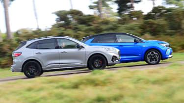 Ford Kuga and Vauxhall Grandland - side action